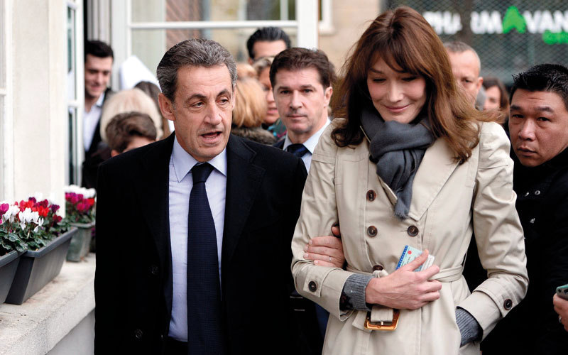 كارلا بروني اكتفت بمرافقة زوجها. أرشيفية