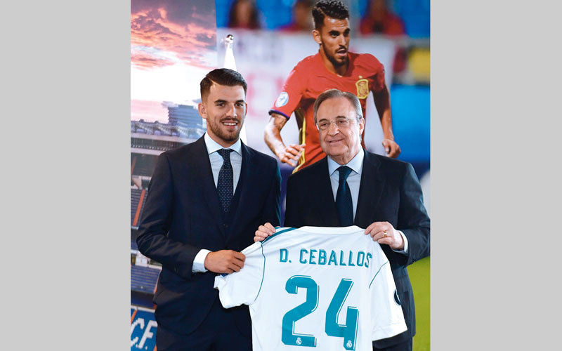 داني سيبايوس سيرتدي قميص ريال مدريد رقم 24. أ.ف.ب
