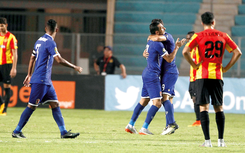علي معلول يحتفل بتسجيله هدف التعادل للأهلي في مرمى الترجي. رويترز