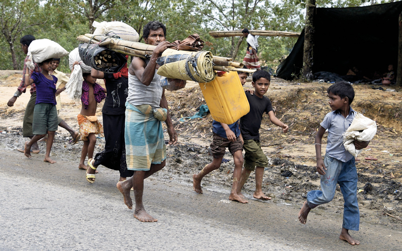 مسلمو الروهينغا فروا للنجاة بأرواحهم. أ.ف.ب