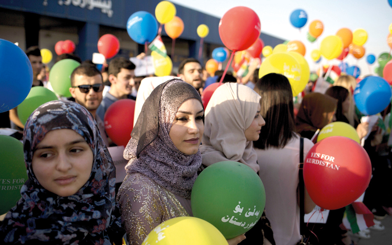 الأكراد يحتفلون بنتيجة الاستفتاء على الاستقلال.  أ.ب