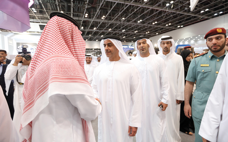 سيف بن زايد خلال زيارته جناح السعودية. من المصدر
