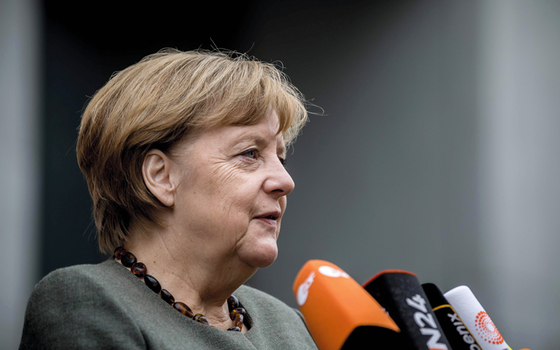 ميركل غنت أثناء حملتها الانتخابية الأخيرة. أ.ف.ب