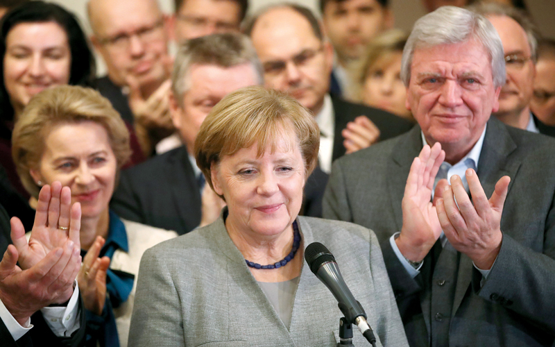 ميركل حظيت بتصفيق حماسي. غيتي