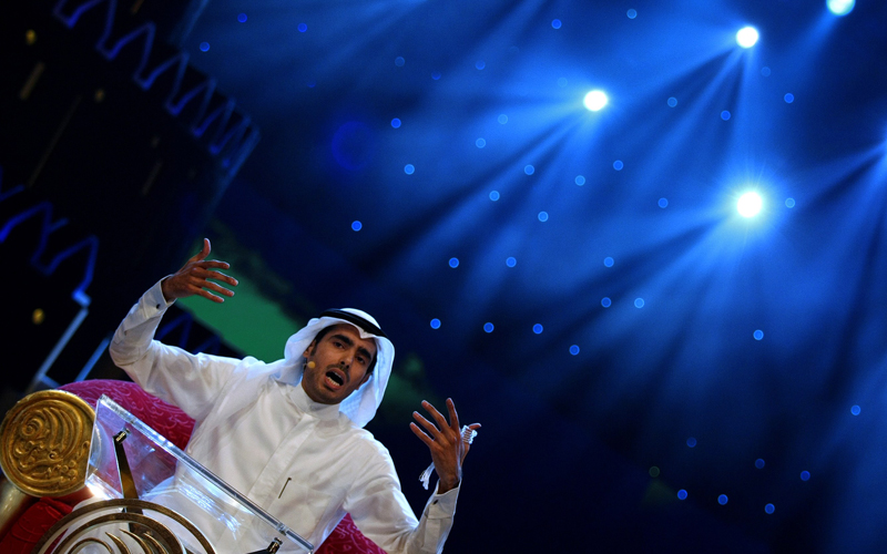 وسطع نجم العجمي عالياً في سماء القوافي-أ.ف.ب