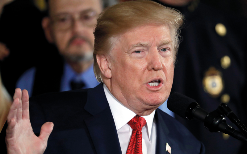 ترامب لا يبدو مقتنعاً باتقافية العمل المشتركة الشاملة.  أ.ب