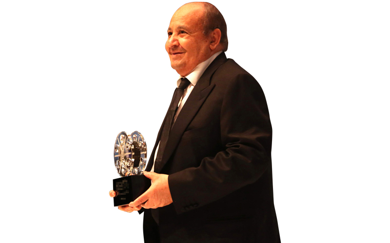 وحيد حامد خلال تكريمه في «دبي السينمائي». تصوير: باتريك كاستيلو