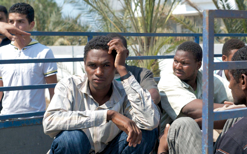 الكثير من المهاجرين الأفارقة تم اعتقالهم بتهمة القتال مع القذافي. أرشيفية