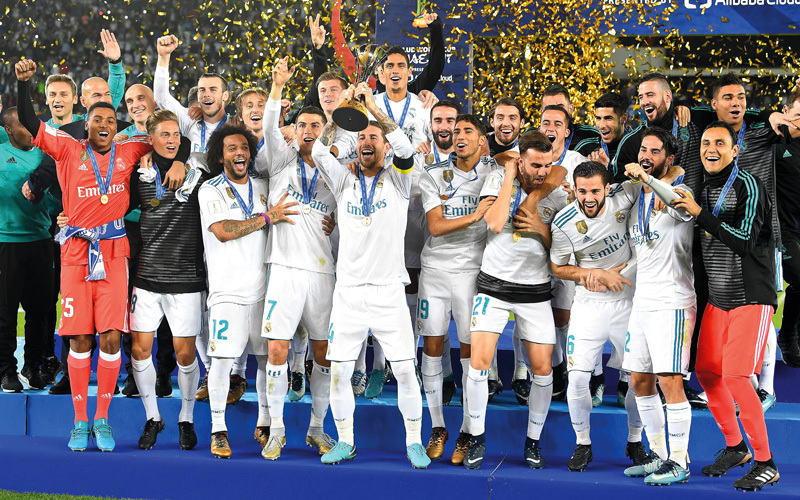 لاعبو ريال مدريد يحتفلون بكأس العالم للأندية٫ تصوير: إريك أرازاس