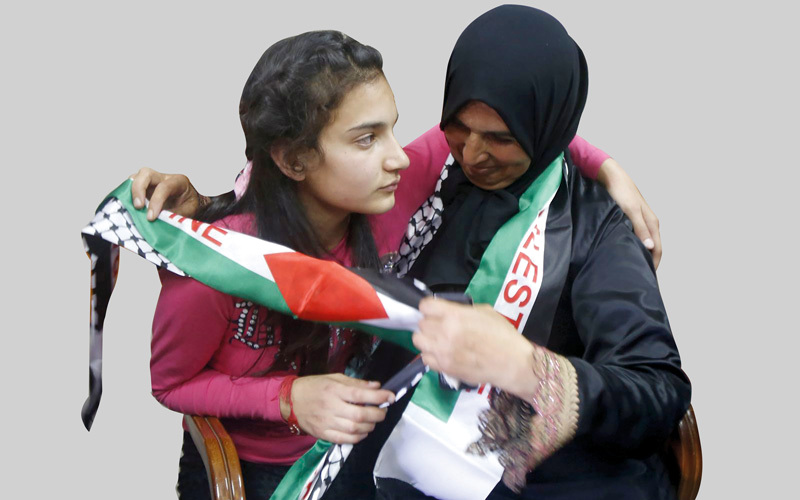 ديما الواوي لحظة الإفراج عنها. من المصدر