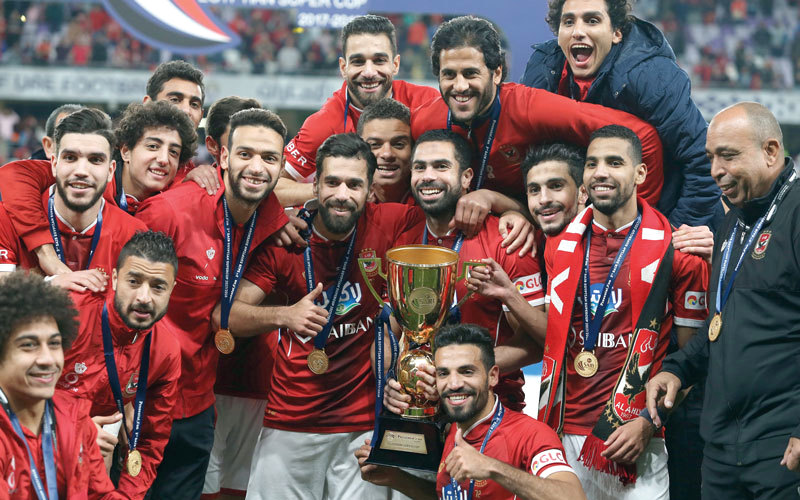 فريق الأهلي القاهري متوجاً بكأس السوبر المصري.

الإمارات اليوم