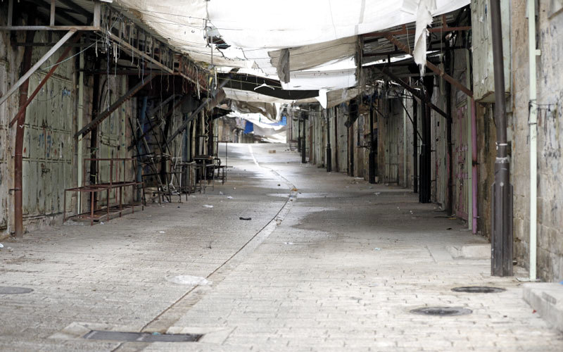 إضراب عام عمّ الأراضي الفلسطينية احتجاجاً على زيارة بنس. أ.ب