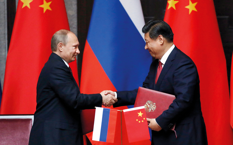 الصين وروسيا متفقتان على ضرب المصالح الغربية.  أ.ب