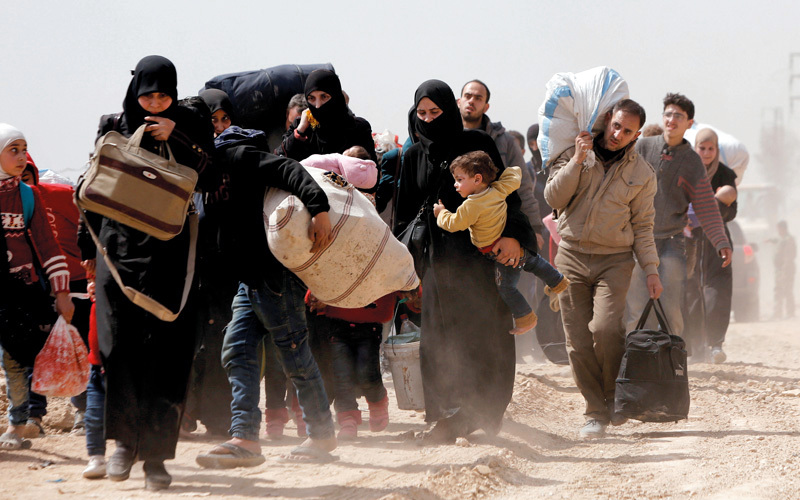 نزوح جماعي قسري من الغوطة الشرقية هرباً من الموت.  رويترز