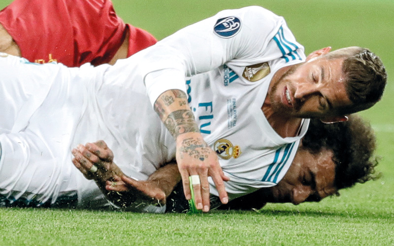 راموس تسبب في إصابة للمصري محمد صلاح.. وساعد ريال مدريد على الفوز بلقب الأبطال. إي.بي.إيه