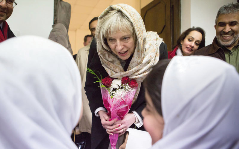 تيريزا ماي في زيارة لمجلس مسلمي بريطانيا. غيتي