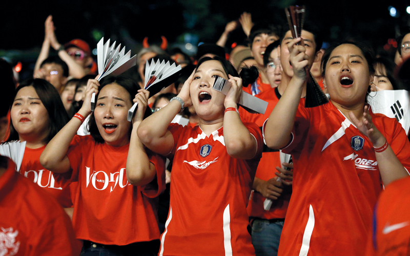 جمهور المنتخب الكوري الجنوبي لم يتوقف عن تشجيع فريقه، رغم الخسارة أمام السويد بهدف دون رد، في المجموعة السادسة. أيه.بي