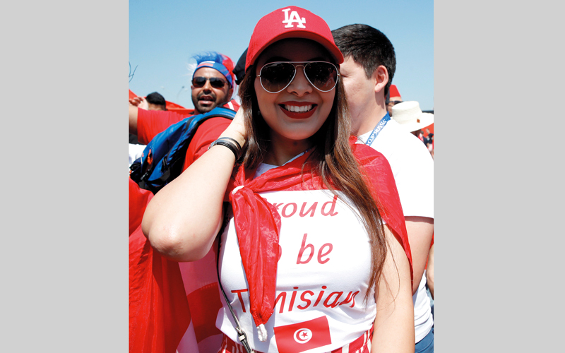 فتاة تونسية حرصت على تشجيع منتخب بلادها، في مواجهة بلجيكا التي أقيمت على ملعب سبارتاك موسكو أمس. رويترز