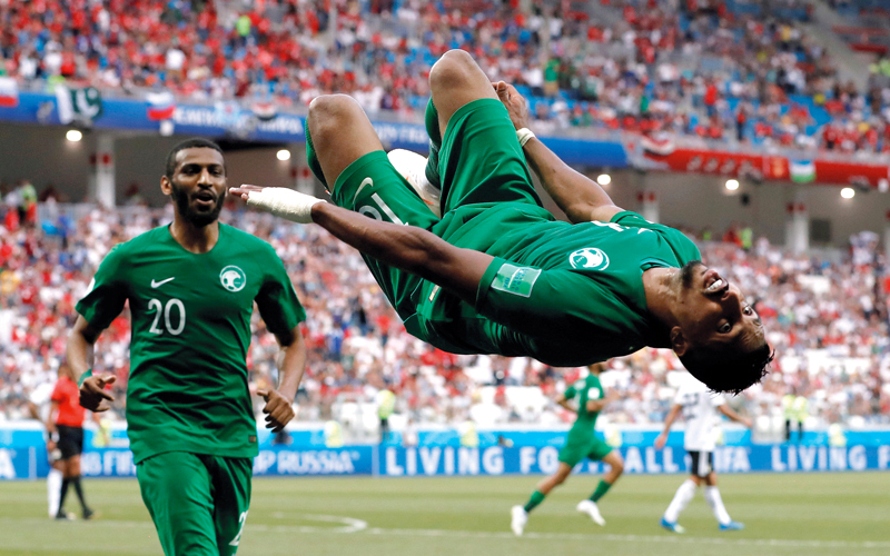 سالم الدوسري يحتفل بهدف فوز السعودية. رويترز