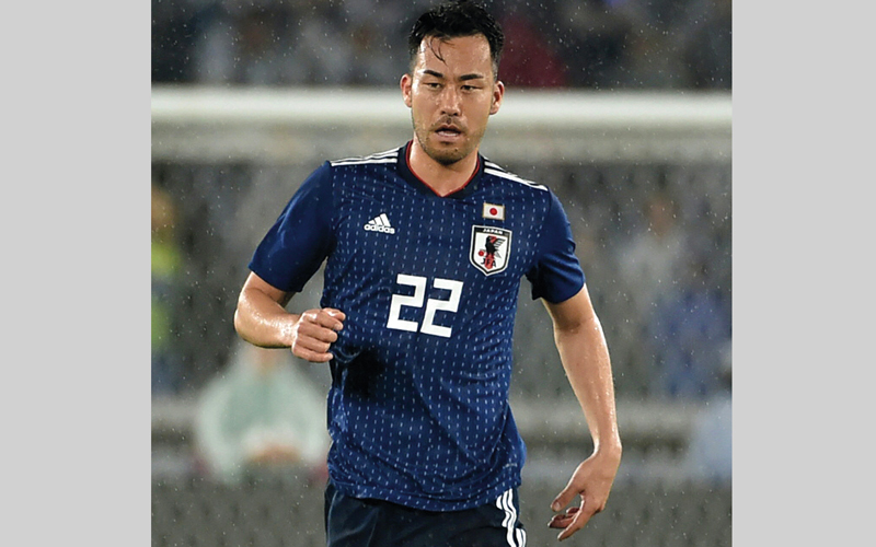 المدافع‭ ‬الياباني‭ ‬الصلب‭ ‬يوشيدا‭ ‬يتأهب‭ ‬لمهاجمي‭ ‬بلجيكا‭.‬‬‬‬‬‬‬‬
أ‭.‬ف‭.‬ب‬‬