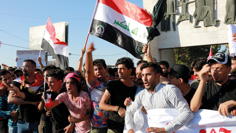 الاحتجاجات العراقية اتسمت بالطابع السلمي في البداية.

إي.بي.إيه