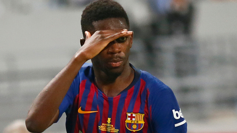 ديمبلي يحتفل بطريقته الخاصة بعد هدف الفوز في إشبيلية. أ.ب