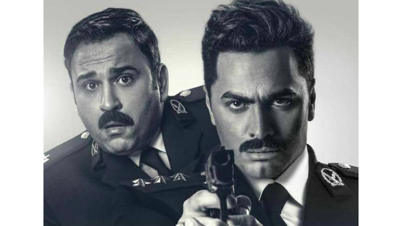 ملصق «البدلة» الدعائي. أرشيفية