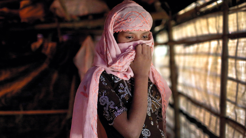 سيدة من الروهينغا تعرضت للاضطها على يد الجنود البورميين. ا.ب