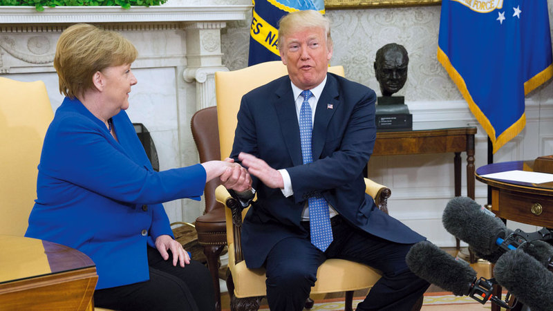 علاقة ترامب مع ميركل كانت متوترة دائماً. ي.ب.أ