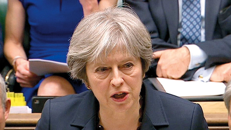 تحاول تيريزا ماي أن تُبقي حزبها كتلة واحدة.  أرشيفية