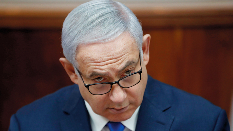 رئيس الوزراء الاسرائيلي في مواجهة قضايا رشا وخيانة أمانة قبيل الانتخابات العامة، رويترز