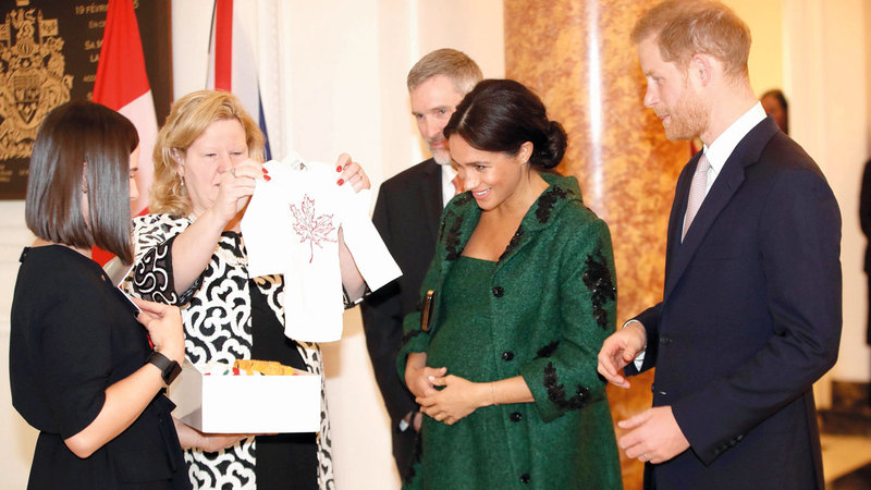 ميغان وزوجها الأمير هاري. أ.ف.ب