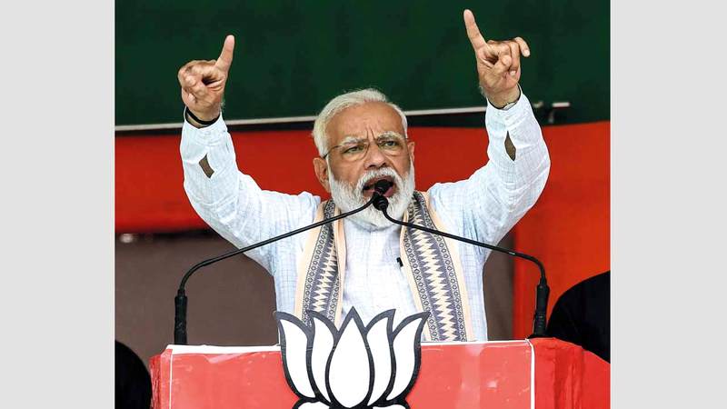مودي يتحدث إلى مؤيديه في تجمع انتخابي. أ.ف.ب