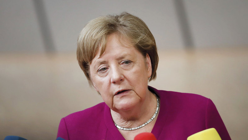 ميركل خاطبت الخريجين عن تجاربها الشخصية. أ.ب