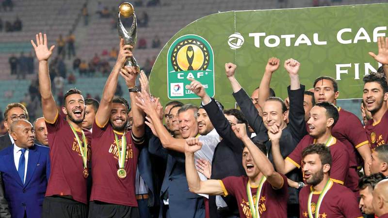 لاعبو الترجي يحتفلون بالفوز بدوري أبطال إفريقيا. أ.ف.ب