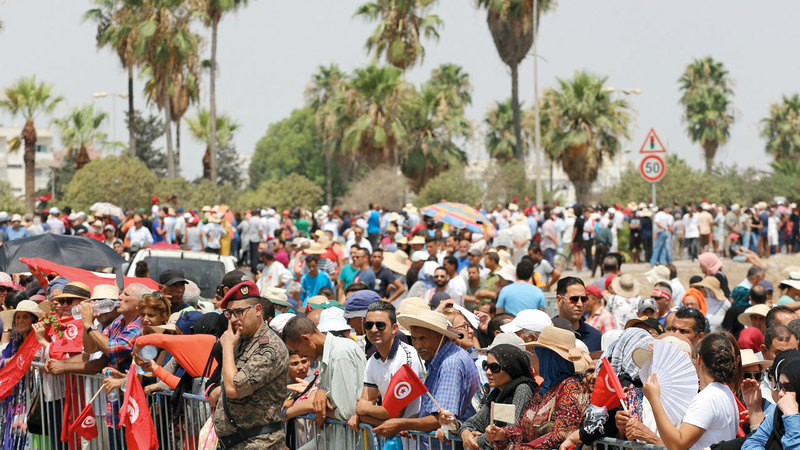 التونسيون احتشدوا لوداع السبسي. أ.ف.ب