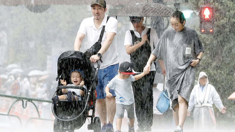 أمطار غزيرة ناجمة عن إعصار فاكساي في طوكيو.

أ.ب