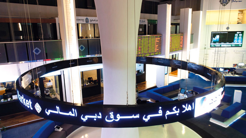 الشركات العقارية التسعة مدرجة في سوقي دبي المالي وأبوظبي للأوراق المالية.  تصوير: أحمد عرديتي
