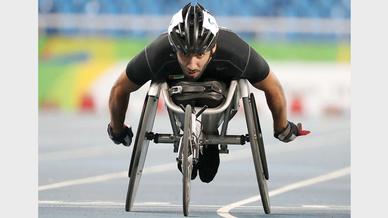 محمد القايد يخوض تمهيدي سباق 400 متر مضمار للكراسي المتحركة. من المصدر