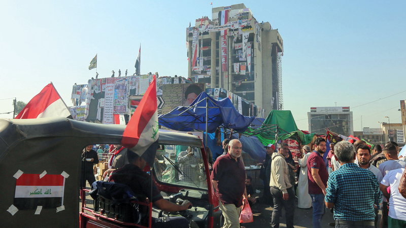 المتظاهرون في ساحة التحرير لم يسلموا من الاعتقالات. أ.ف.ب