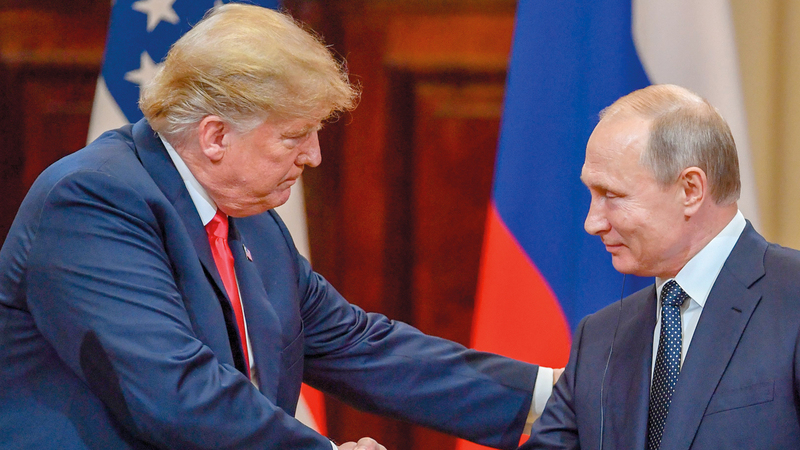 بوتين مع الرئيس الأميركي.  أ.ف.ب