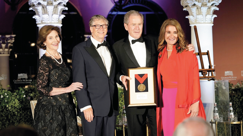 جورج بوش كانت له علاقة وثيقة بمؤسس «مايكروسوفت».  أرشيفية