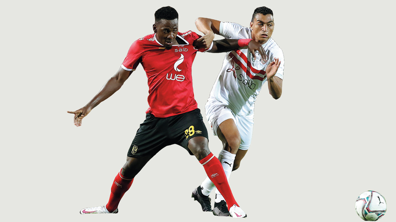 مهاجم الزمالك مصطفى محمد في طريقه للتخلص من محترف الأهلي أغاي.    إي.بي.إيه