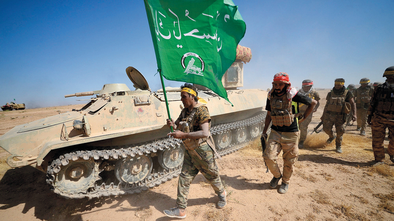 رغم محاولة الحكومة السيطرة على قوات الحشد الشعبي إلا أن بعضها على الأقل لايزال يعمل خارج سيطرة الدولة. رويترز
