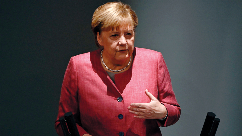 ميركل تعد بمستقبل أفضل لألمانيا الموحدة. أ.ف.ب