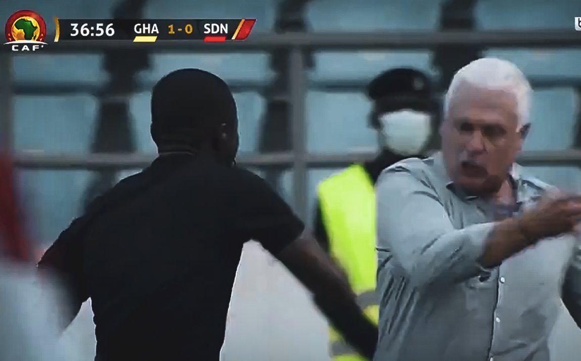 In pictures a referee attacks the Sudan coach and throws him to the ground during the match