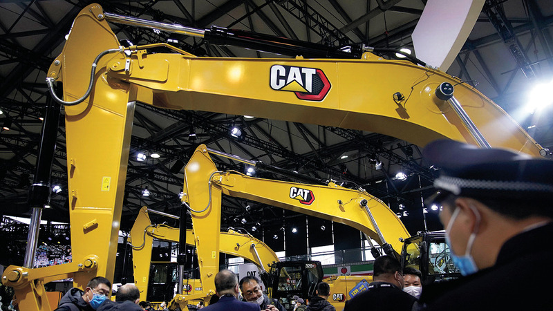 معدات ثقيلة بالمعرض التجاري في مدينة شنغهاي بالصين، فمعظم الشركات الغربية تختار الصين كدولة منشأ لصناعاتها. رويترز