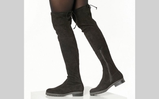 الصورة: بوت فوق الركبة.. إطلالة مفعمة بالأنوثة في الشتاء