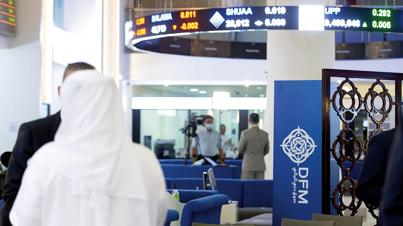 ارتفاع أسهم 11 شركة من أصل 28 شركة تم تداول أسهمها في «دبي المالي». تصوير: أحمد عرديتي