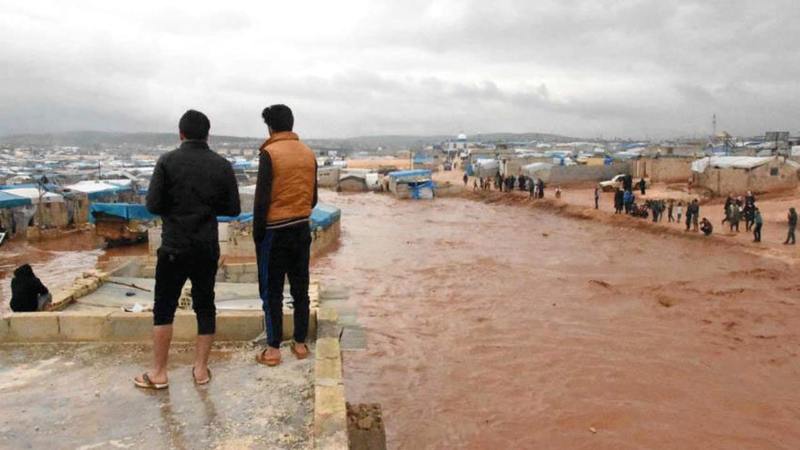 الأمطار الغزيرة دمرت خيام وبيوت اللاجئين المؤقتة.     أرشيفية